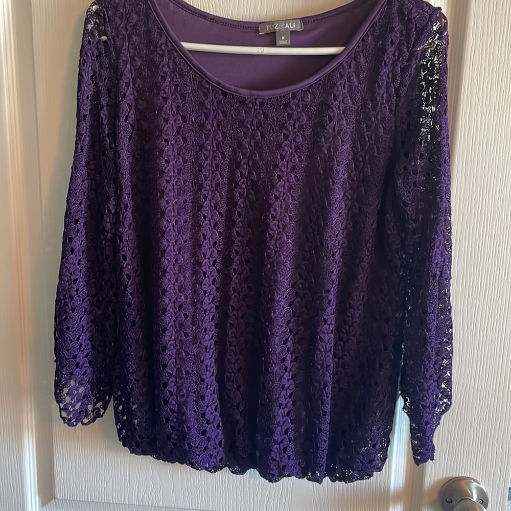 Women’s size medium blouse with half sleeve. dark purple. Great condition